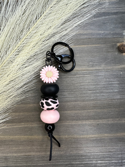 Pink daisy pink cow keychain