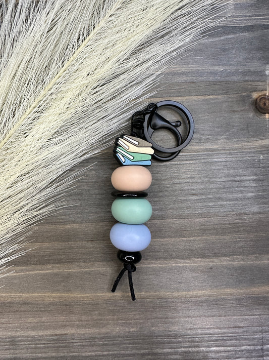 Pastel stack of books keychain